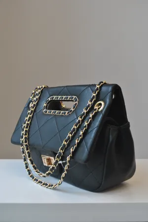 BLACK GUILTED HANDBAG WITH CUTOFF  HANDLE AND GOLD CHAIN