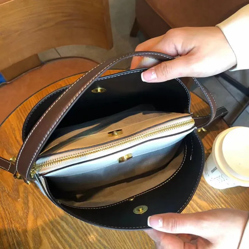 Dena Barrel Crossbody