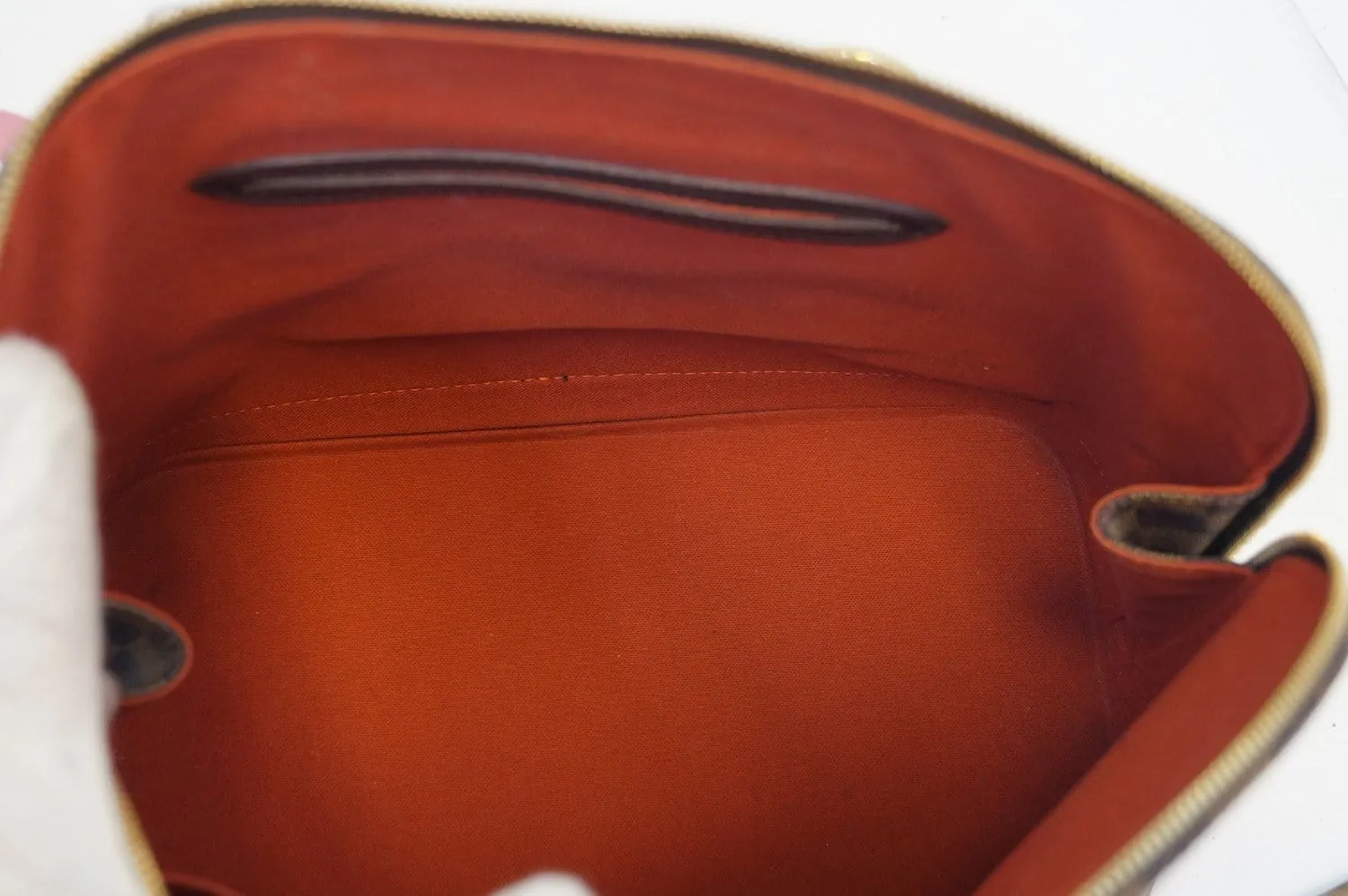LOUIS VUITTON Damier Ebene Alma Brown Handbag