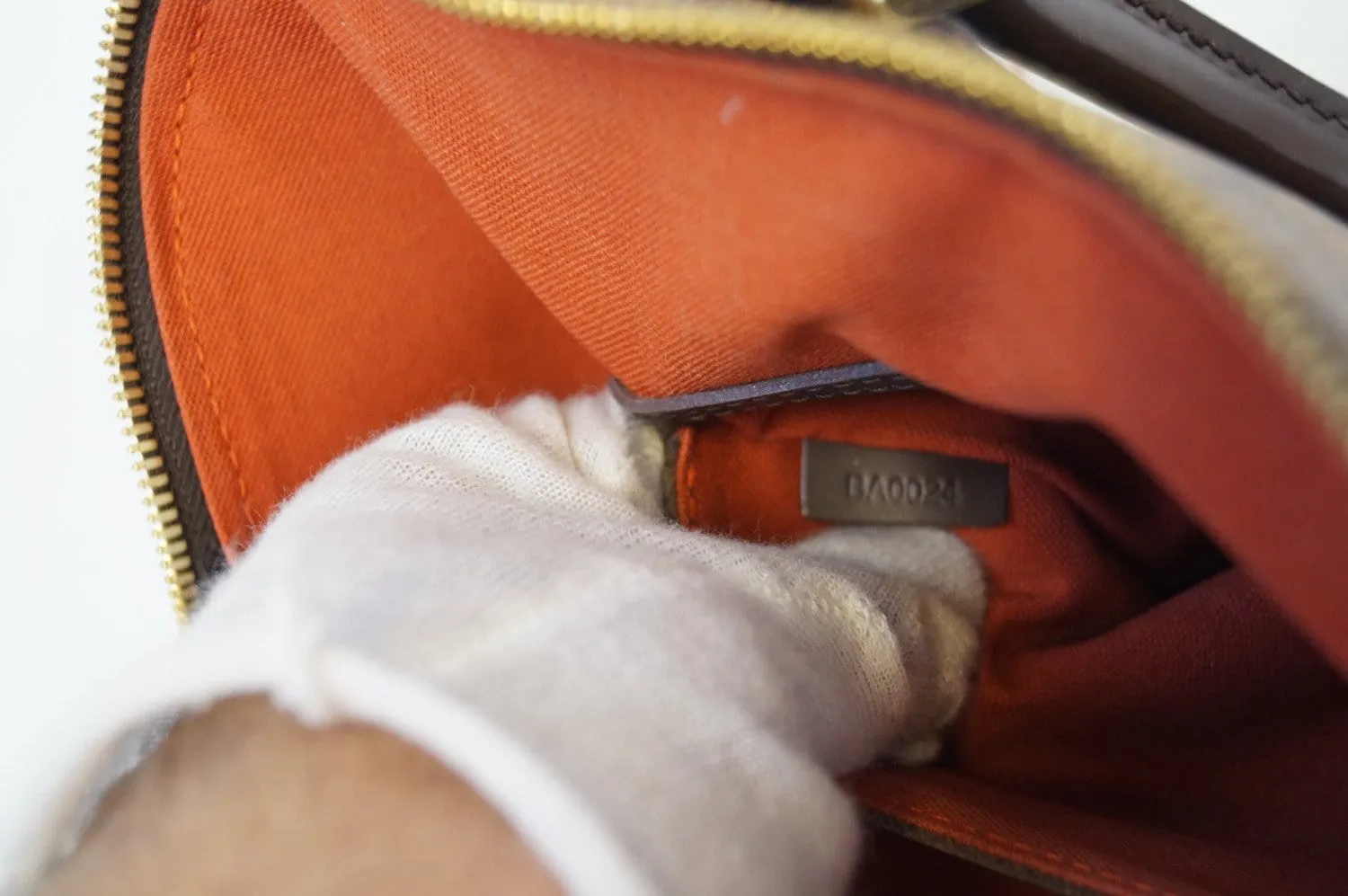 LOUIS VUITTON Damier Ebene Alma Brown Handbag
