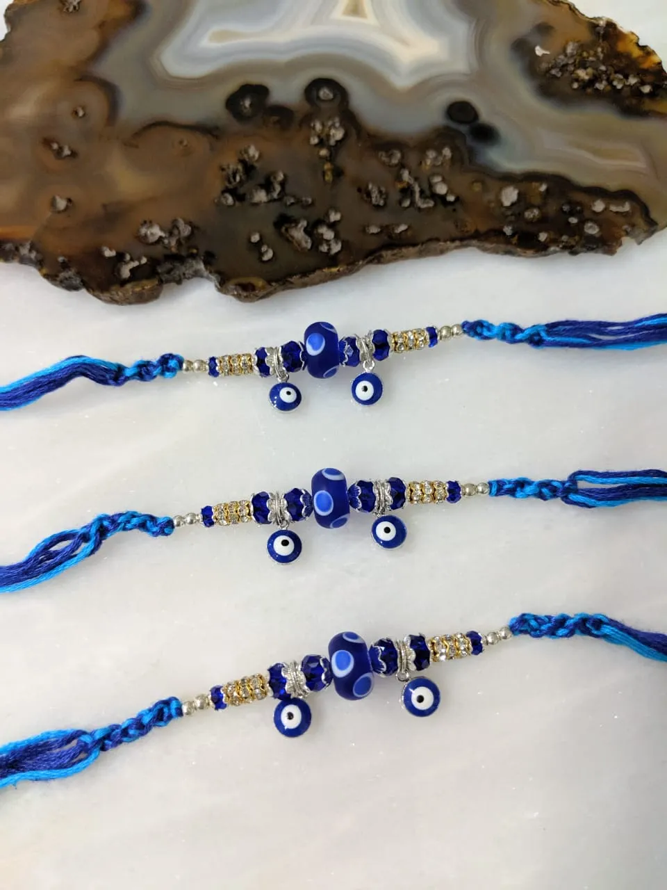 (Set of 3) Navy Blue Evil Eye Rakhi for Men Gold Ring Stone and Beads Rakhi