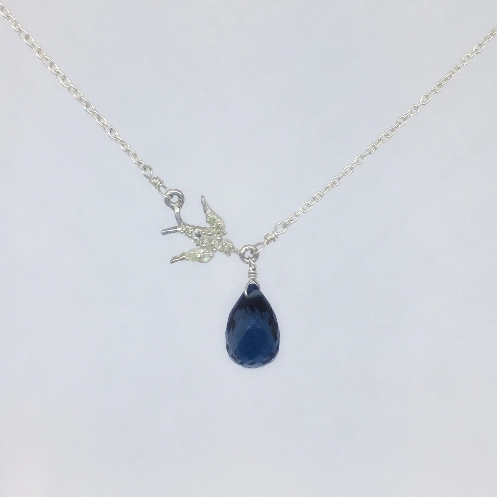 Sterling Silver Necklace With Blue Topaz Briolette and Diamond Bird