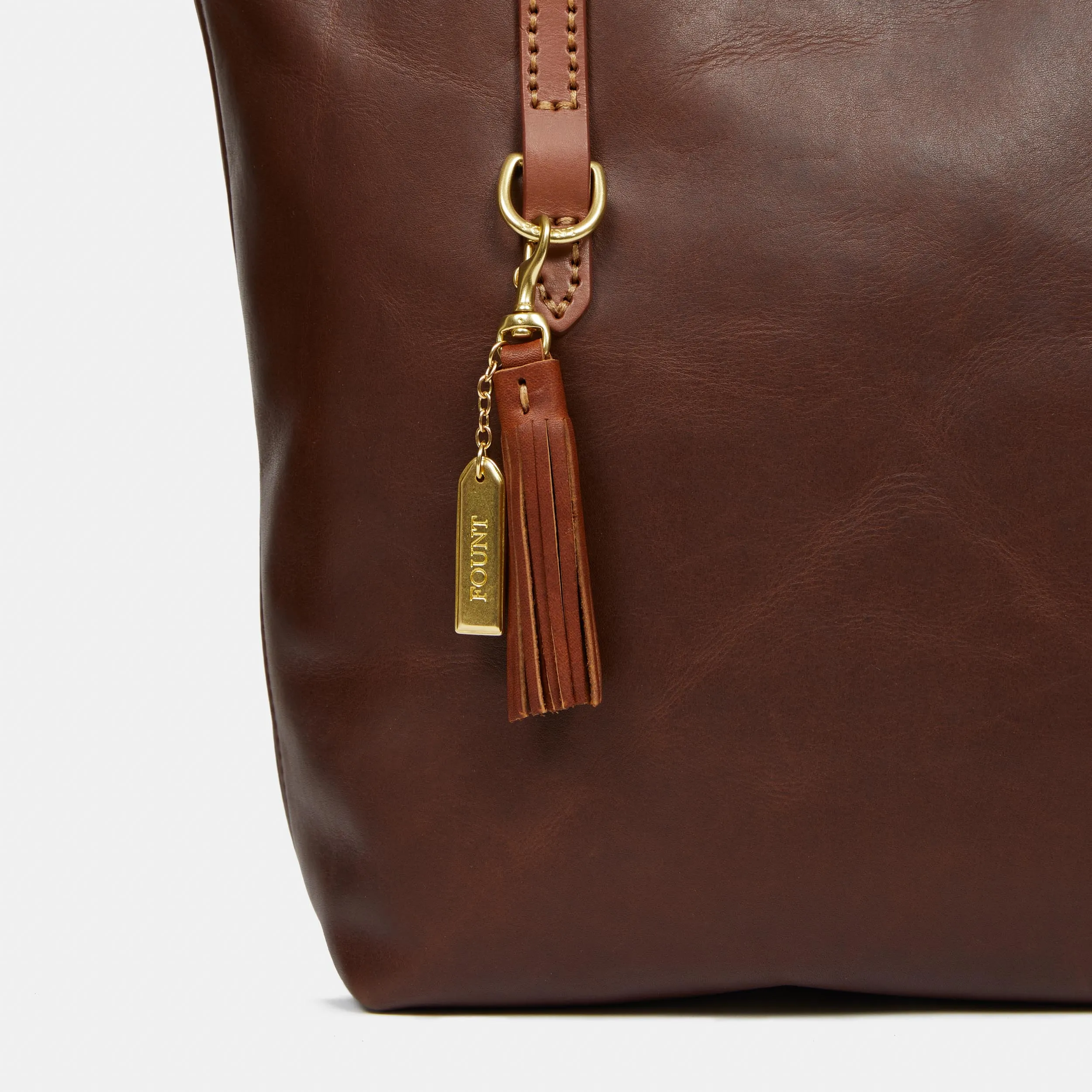 The Classic Tassel Charm