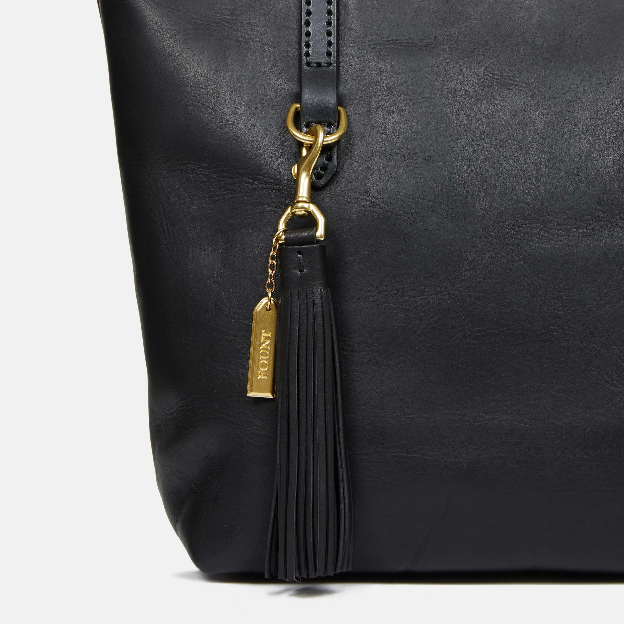 The Grand Tassel Charm