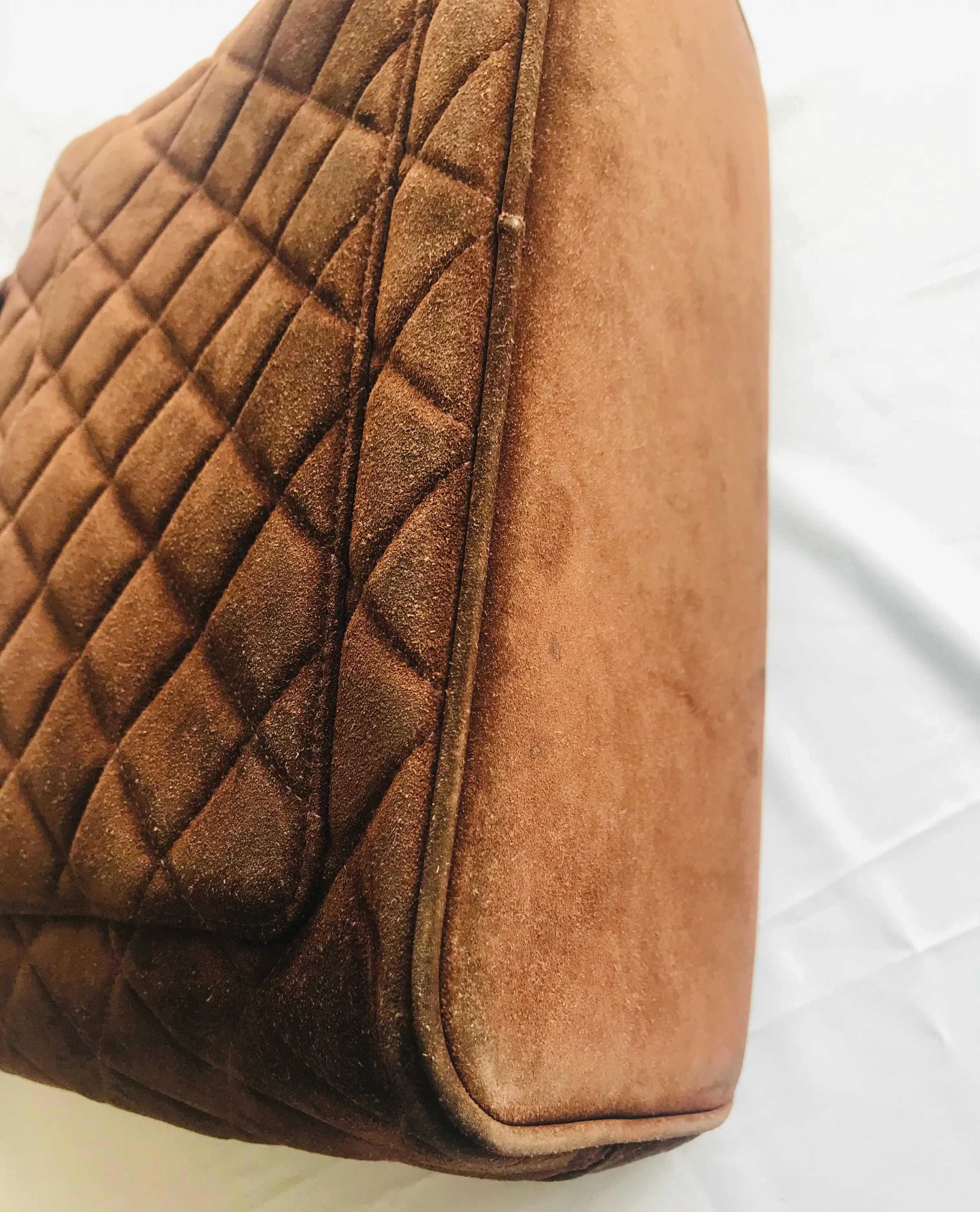 Vintage CHANEL brown suede classic tote bag with large CC mark and golden CC medal charm to the zipper. Classic purse for daily use.