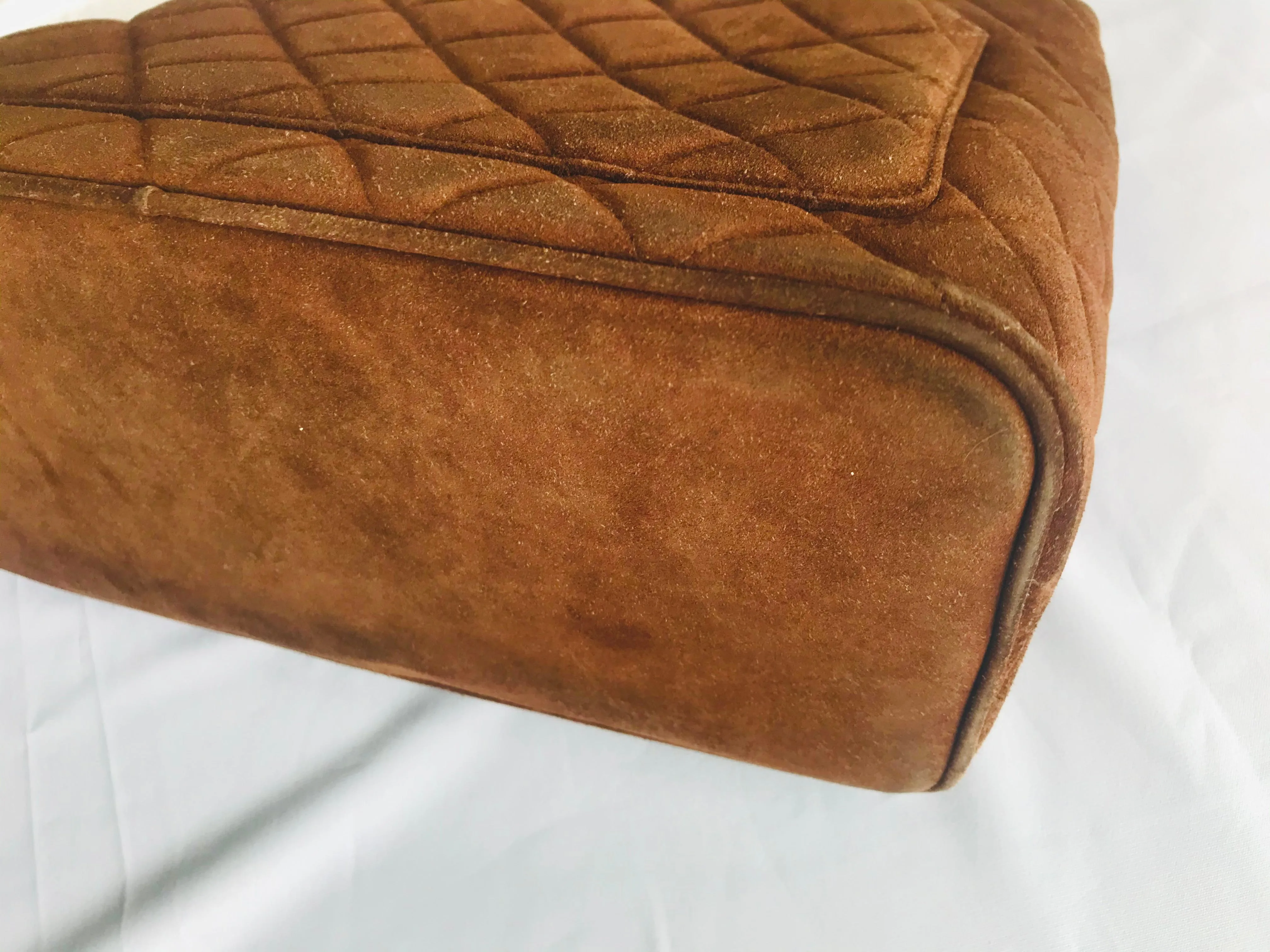 Vintage CHANEL brown suede classic tote bag with large CC mark and golden CC medal charm to the zipper. Classic purse for daily use.
