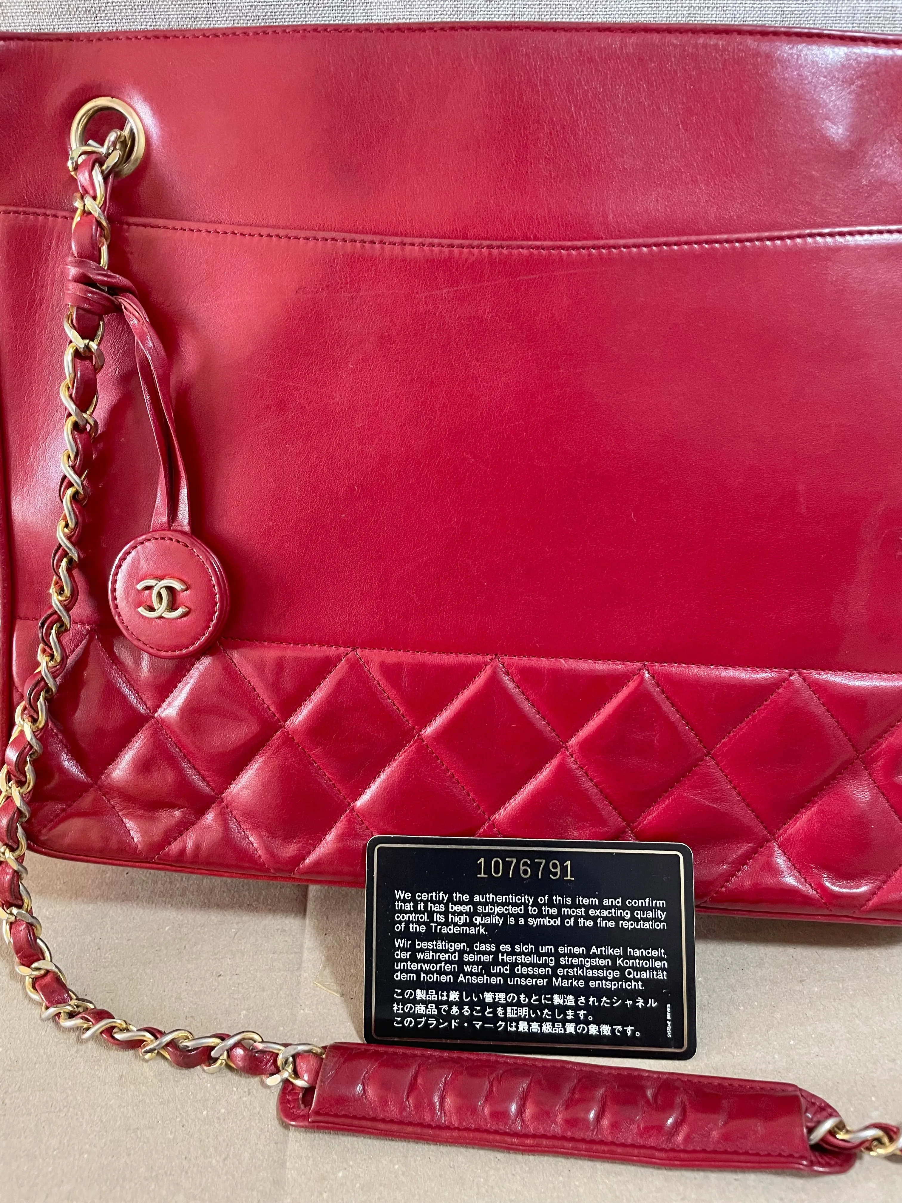 Vintage CHANEL red calfskin classic shoulder tote bag with gold tone chains and CC charm. Classic purse. 0506284